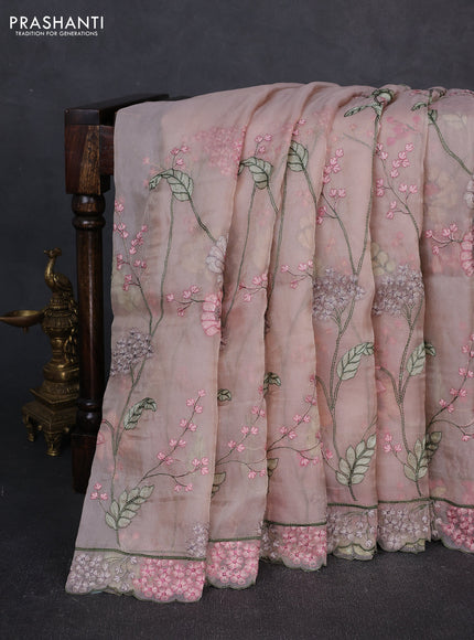 Tissue organza saree pastel pink shade with allover floral embroidery and embroidery border