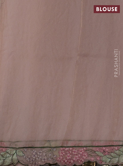Tissue organza saree pastel pink shade with allover floral embroidery and embroidery border