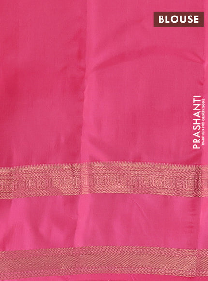Kanchipuram silk saree pale orange and peach pink with allover zari weaves & buttas and long rettapet zari woven border