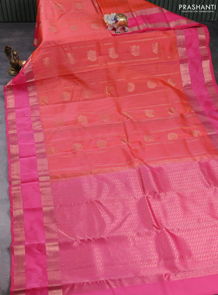Kanchipuram silk saree peach orange and peach pink with allover zari weaves & buttas and long rettapet zari woven border