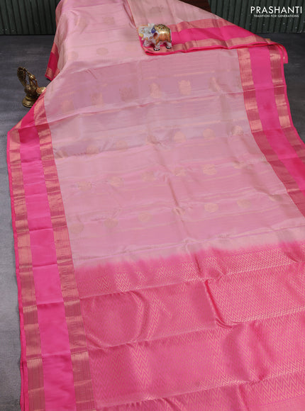 Kanchipuram silk saree pastel pink and peach pink with allover zari weaves & buttas and long rettapet zari woven border