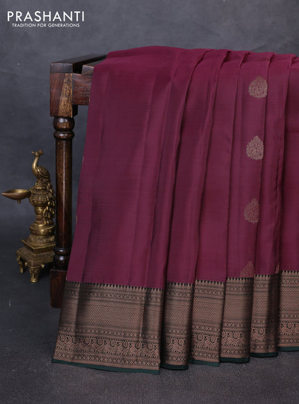 Kanchipuram silk saree magenta pink and bottle green with allover copper zari woven buttas and zari woven border