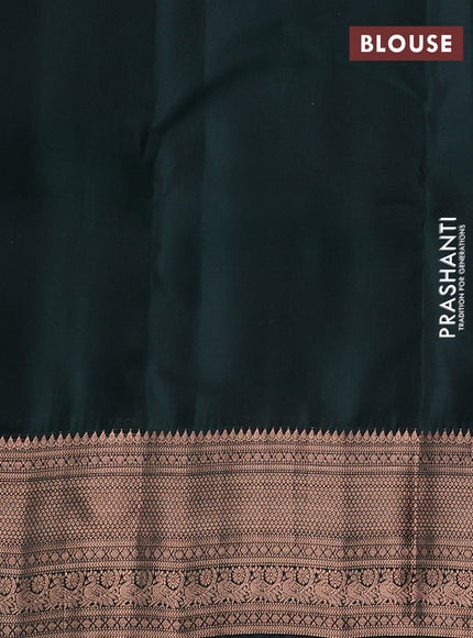 Kanchipuram silk saree rust shade and bottle green with copper zari woven buttas and copper zari woven border