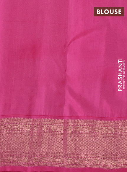 Kanchipuram silk saree dual shade of pinkish yellow and pink with allover copper zari woven buttas and zari woven border
