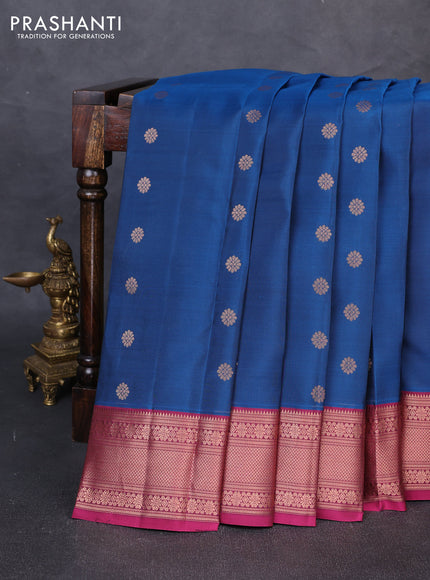 Kanchipuram silk saree peacock blue and pink with allover copper zari woven buttas and zari woven border