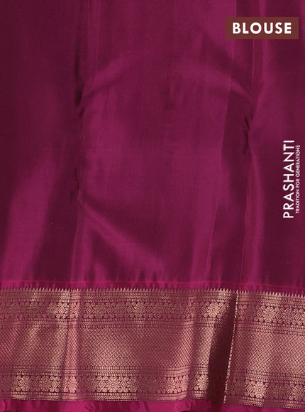 Kanchipuram silk saree peacock blue and pink with allover copper zari woven buttas and zari woven border