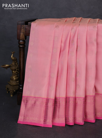 Kanchipuram silk saree pastel pink and peach pink with allover copper zari woven buttas and copper zari woven border