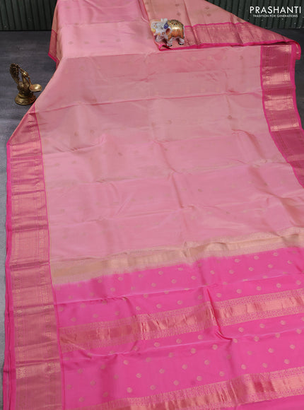 Kanchipuram silk saree pastel pink and peach pink with allover copper zari woven buttas and copper zari woven border