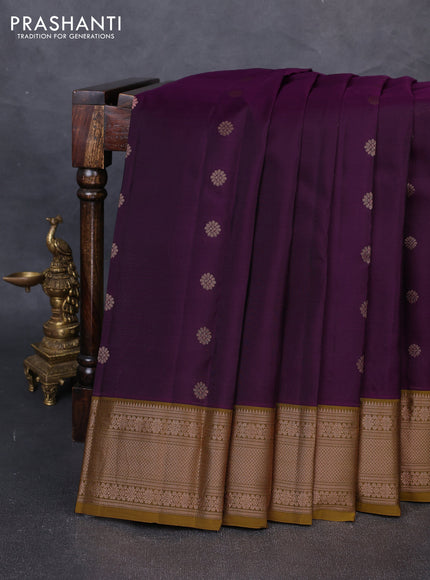 Kanchipuram silk saree deep purple and mustard green with allover copper zari woven buttas and copper zari woven border