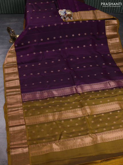 Kanchipuram silk saree deep purple and mustard green with allover copper zari woven buttas and copper zari woven border