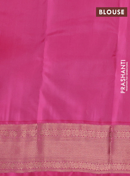 Kanchipuram silk saree peach orange and pink with allover copper zari woven buttas and copper zari woven border