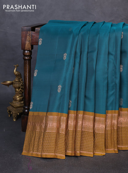 Kanchipuram silk saree green and mustard green with allover copper zari woven buttas and copper zari woven border