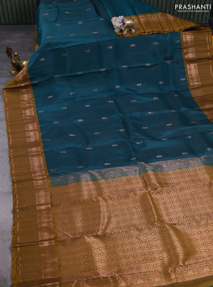 Kanchipuram silk saree green and mustard green with allover copper zari woven buttas and copper zari woven border