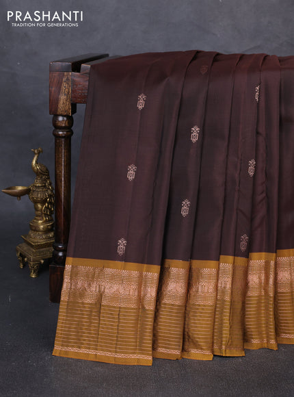 Kanchipuram silk saree coffee brown and mustard green with allover copper zari woven buttas and copper zari woven border