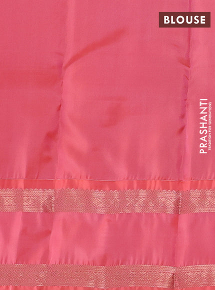 Kanchipuram silk saree pastel pink and peach orange with allover copper zari woven buttas and rettapet copper zari woven border