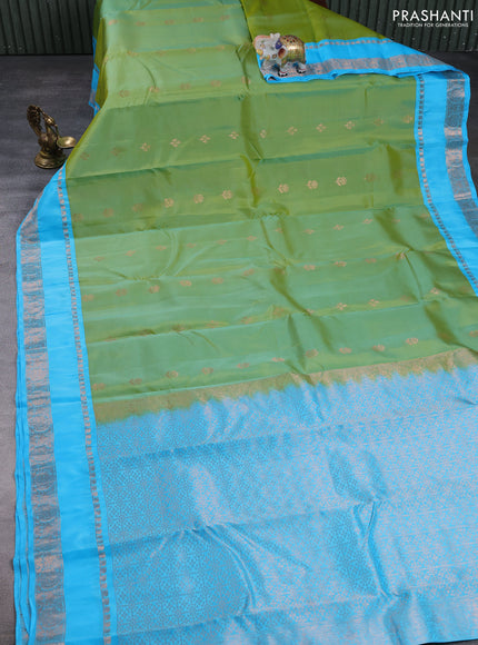 Kanchipuram silk saree teal green and light blue with copper zari woven buttas and rettapet copper zari woven border