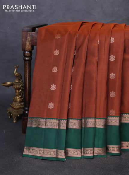 Kanchipuram silk saree rust shade and green with copper zari woven buttas and rettapet copper zari woven border