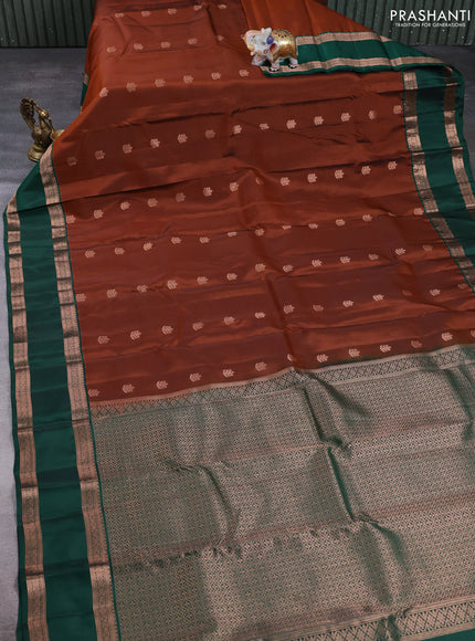 Kanchipuram silk saree rust shade and green with copper zari woven buttas and rettapet copper zari woven border