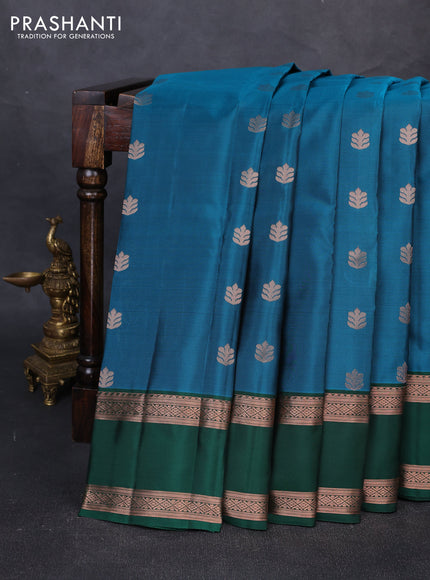 Kanchipuram silk saree peacock blue and bottle green with copper zari woven buttas and rettapet copper zari woven border
