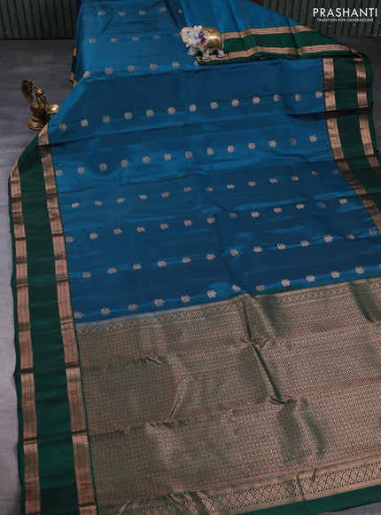 Kanchipuram silk saree peacock blue and bottle green with copper zari woven buttas and rettapet copper zari woven border