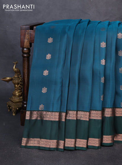 Kanchipuram silk saree peacock green and bottle green with copper zari woven buttas and rettapet copper zari woven border