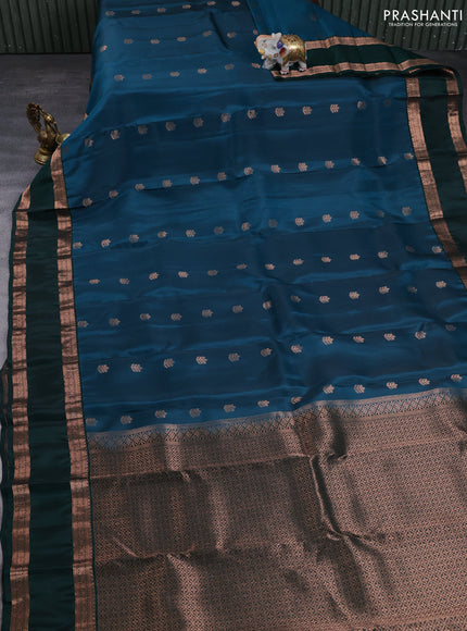 Kanchipuram silk saree peacock green and bottle green with copper zari woven buttas and rettapet copper zari woven border