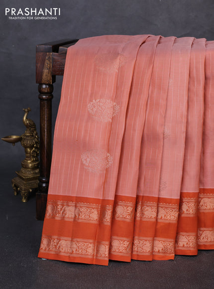 Kanchipuram silk saree pastel pink and rust shade with allover zari weaves & buttas and rettapet copper zari woven border