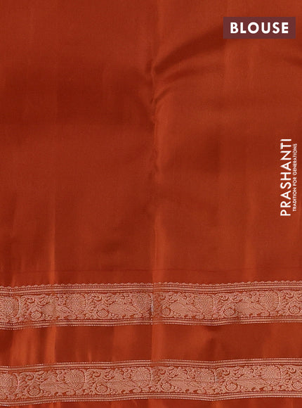 Kanchipuram silk saree pastel pink and rust shade with allover zari weaves & buttas and rettapet copper zari woven border