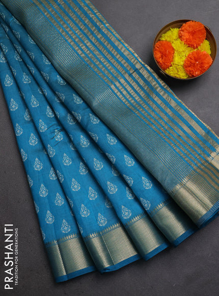 Semi raw silk saree teal blue with allover butta prints and zari woven border