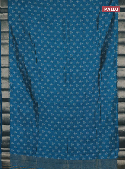 Semi raw silk saree teal blue with allover butta prints and zari woven border