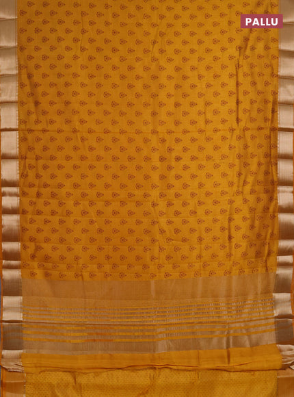 Semi raw silk saree dark mustard with allover butta prints and zari woven border