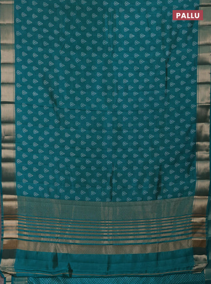 Semi raw silk saree teal green with allover butta prints and zari woven border