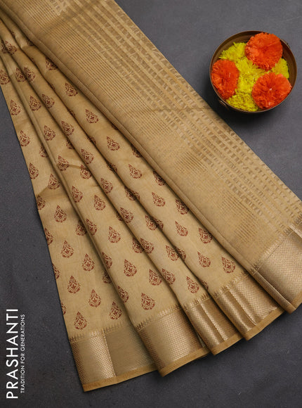 Semi raw silk saree sandal with allover butta prints and zari woven border