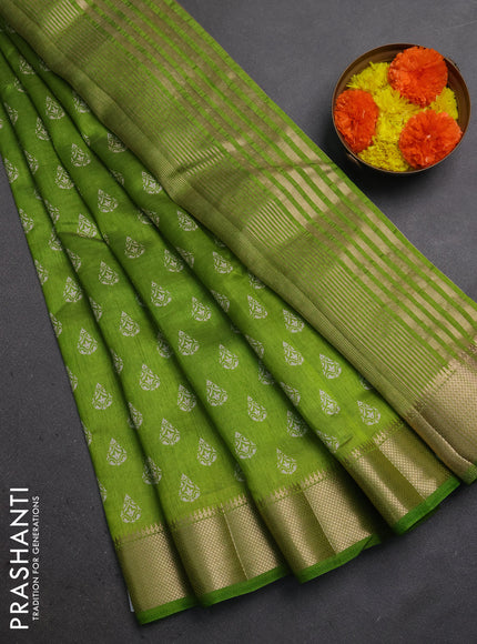 Semi raw silk saree light green with allover butta prints and zari woven border