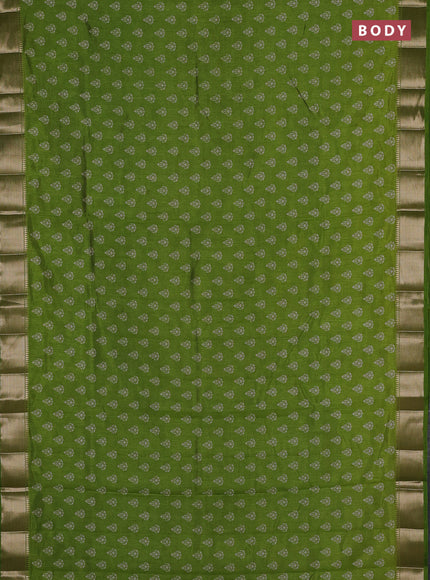 Semi raw silk saree light green with allover butta prints and zari woven border
