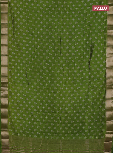 Semi raw silk saree light green with allover butta prints and zari woven border