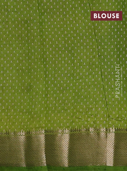 Semi raw silk saree light green with allover butta prints and zari woven border
