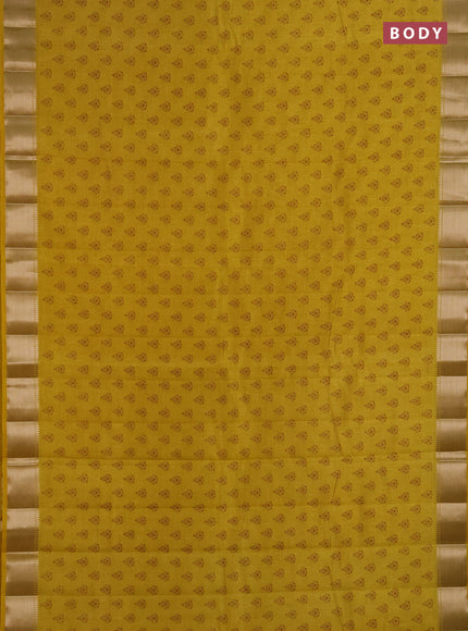 Semi raw silk saree mustard yellow with allover butta prints and zari woven border