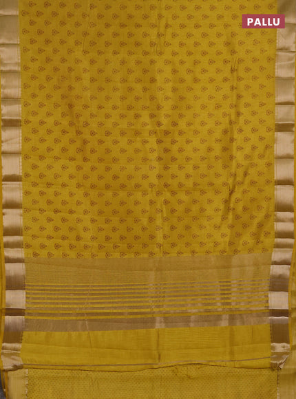 Semi raw silk saree mustard yellow with allover butta prints and zari woven border