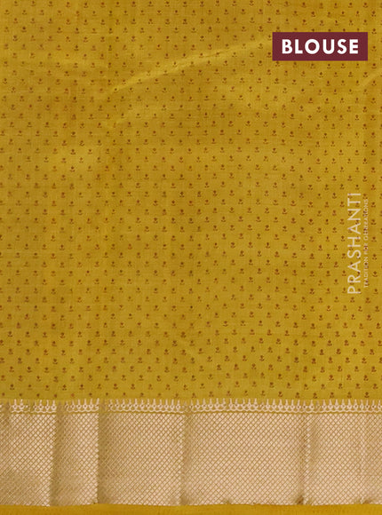 Semi raw silk saree mustard yellow with allover butta prints and zari woven border