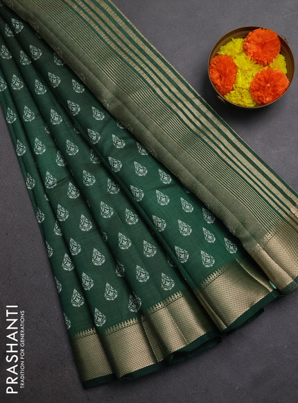 Semi raw silk saree bottle green with allover butta prints and zari woven border