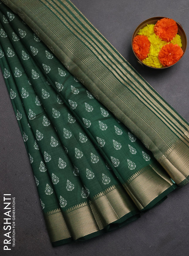 Semi raw silk saree bottle green with allover butta prints and zari woven border