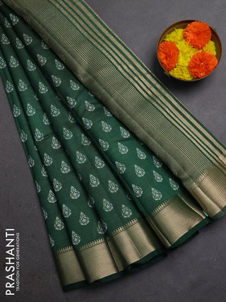 Semi raw silk saree bottle green with allover butta prints and zari woven border