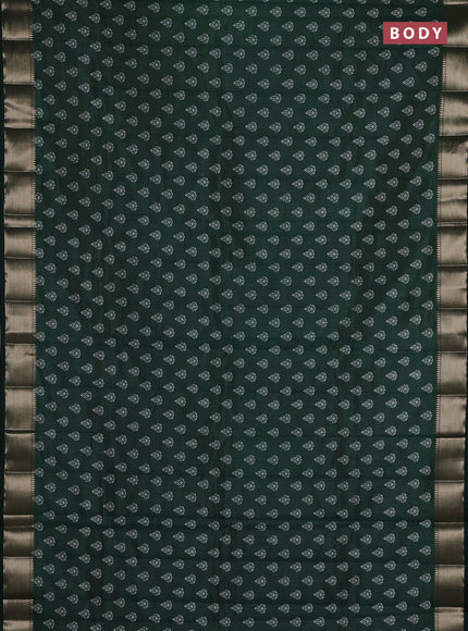 Semi raw silk saree bottle green with allover butta prints and zari woven border