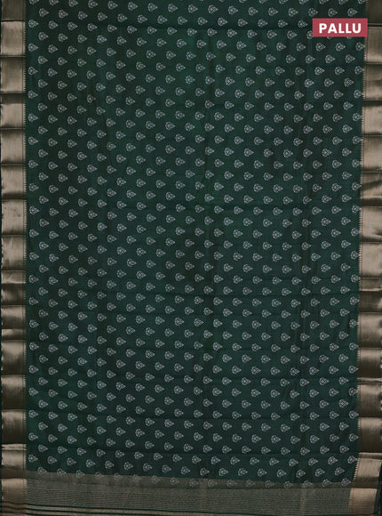 Semi raw silk saree bottle green with allover butta prints and zari woven border
