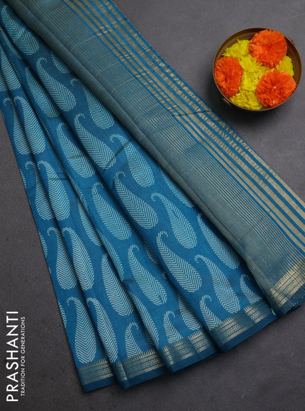 Semi raw silk saree teal blue with allover paisley butta prints and zari woven border