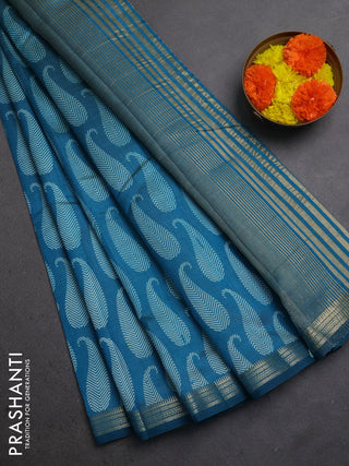 Semi raw silk saree teal blue with allover paisley butta prints and zari woven border