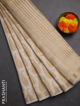Semi raw silk saree cream with allover paisley butta prints and zari woven border