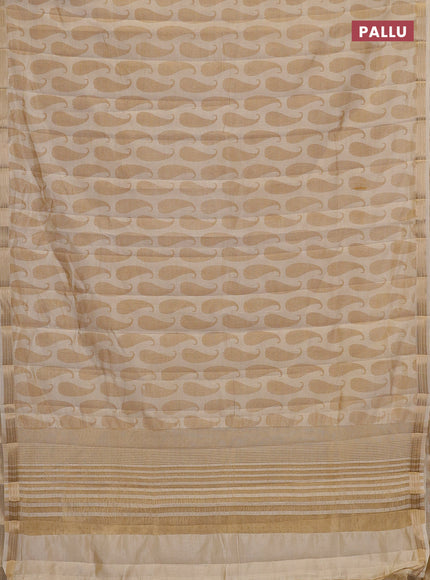 Semi raw silk saree cream with allover paisley butta prints and zari woven border