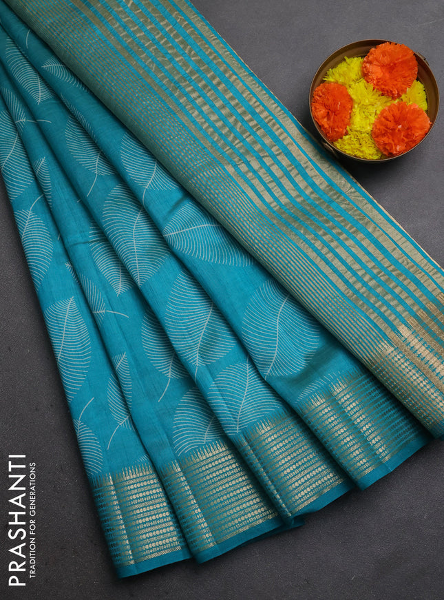 Semi raw silk saree teal blue with allover butta prints and temple design zari woven border